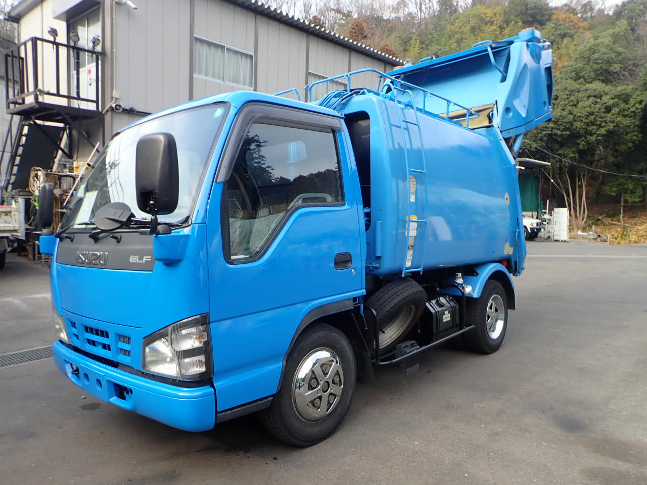 9-H18エルフ 2t プレスパッカー車